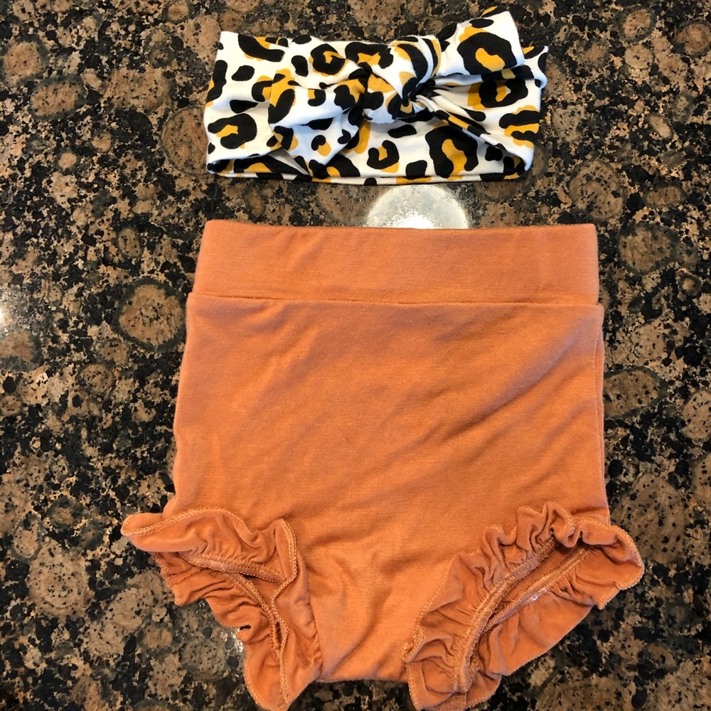 High waisted shorts and head wrap